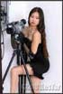 Nikki plays with cameras in the studio